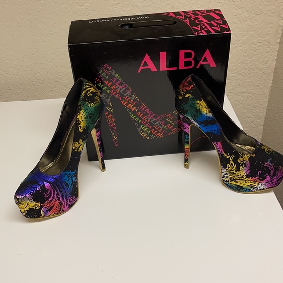 Size 9. Black multi colored heels. Worn twice. Original box. No rips. Like new - Picture 5 of 5